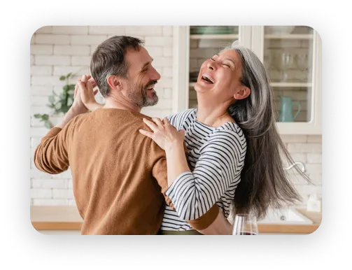 couple dancing in kitchen